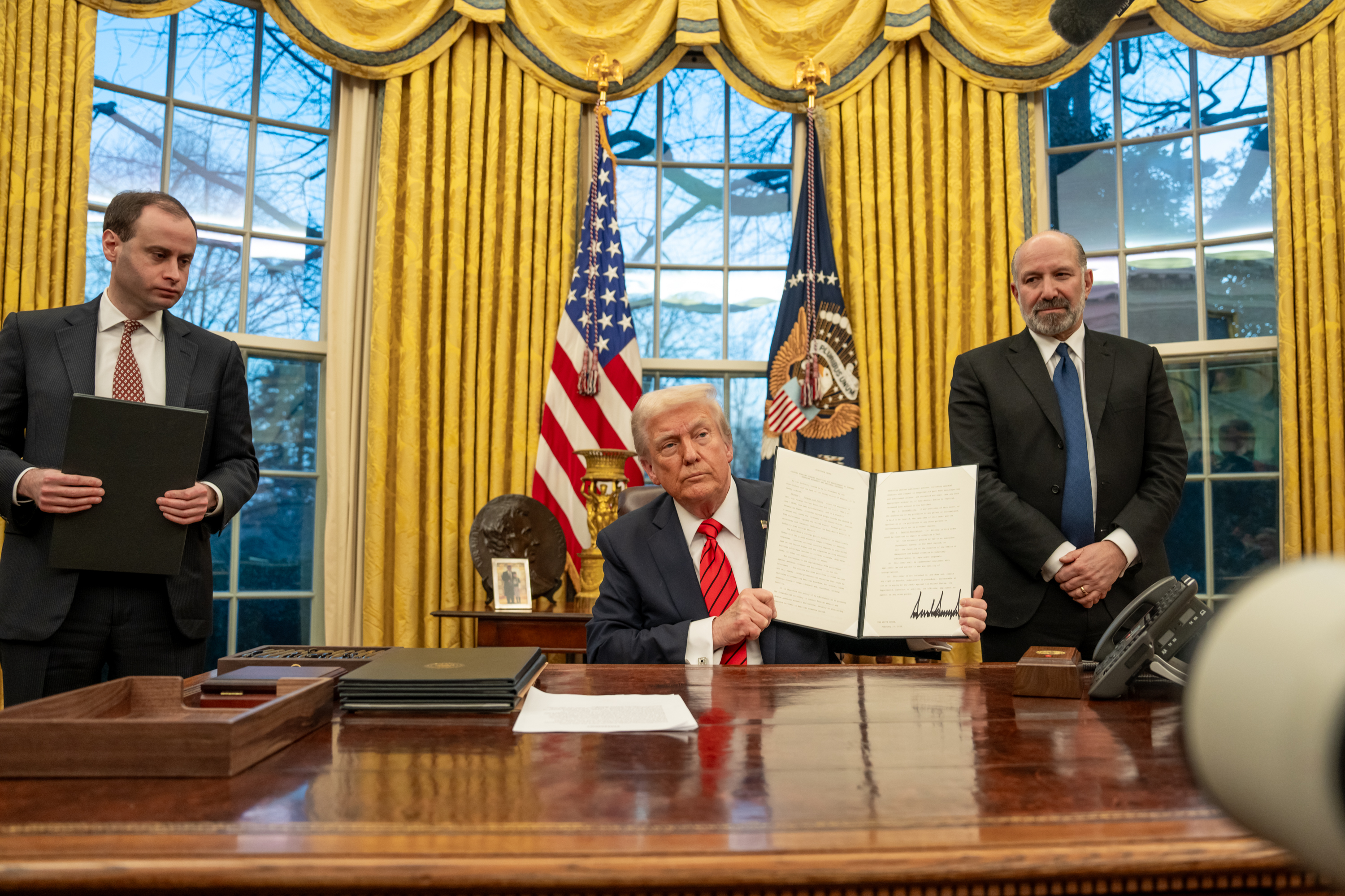 President Trump signing the Preventing Woke AI executive order in the Oval Office